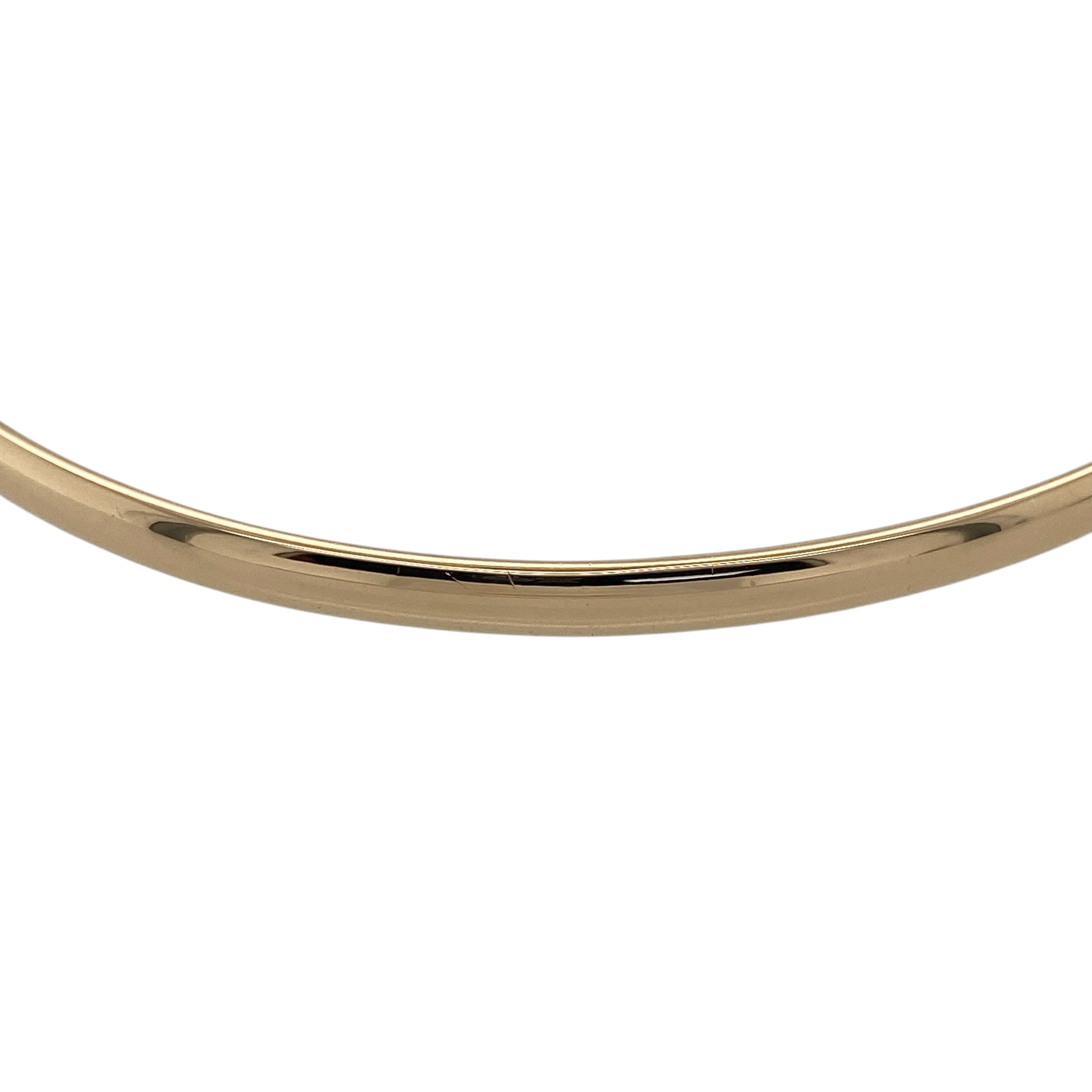 Add a timeless and versatile piece to your jewellery collection with this pre-owned 9ct yellow gold solid plain bangle, offering classic simplicity with a slightly bolder profile—perfect for everyday wear or stacking.

Design: The bangle features a smooth, rounded profile with a plain polished finish, creating a clean and elegant look.
Material: Made from 9-carat yellow gold, it has a polished surface that enhances its warm tone and timeless appeal.