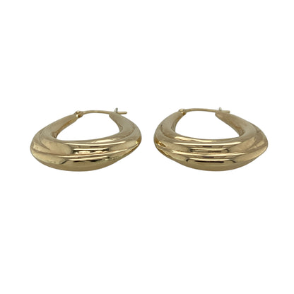 Add a stylish and elegant touch to your jewellery collection with these pre-owned 9ct yellow gold twisted oval creole earrings, combining classic shape with a modern twist—perfect for everyday wear or special occasions.

Design: The earrings feature an oval creole shape with a twisted design, creating a flowing and eye-catching look that reflects light beautifully.
Material: Made from 9-carat yellow gold, they have a polished finish that enhances their warm tone and highlights the twisted detail.
