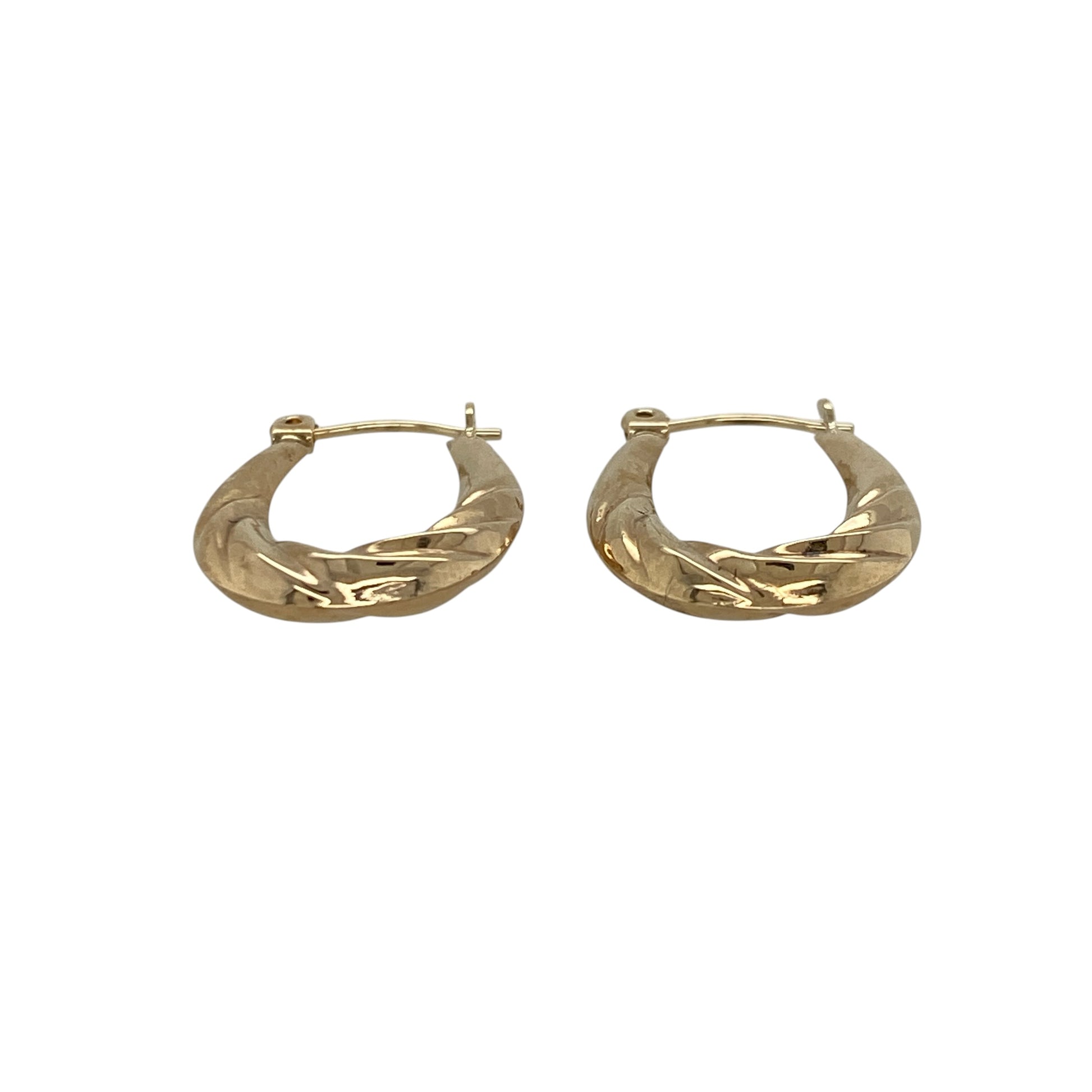 Add a subtle and stylish touch to your jewellery collection with these pre-owned 9ct yellow gold small twisted oval creole earrings, combining classic shape with delicate detail—perfect for everyday wear.

Design: The earrings feature a small oval creole shape with a twisted design, creating a gentle and light-catching effect.
Material: Made from 9-carat yellow gold, they have a polished finish that enhances their warm tone and highlights the twist detail.