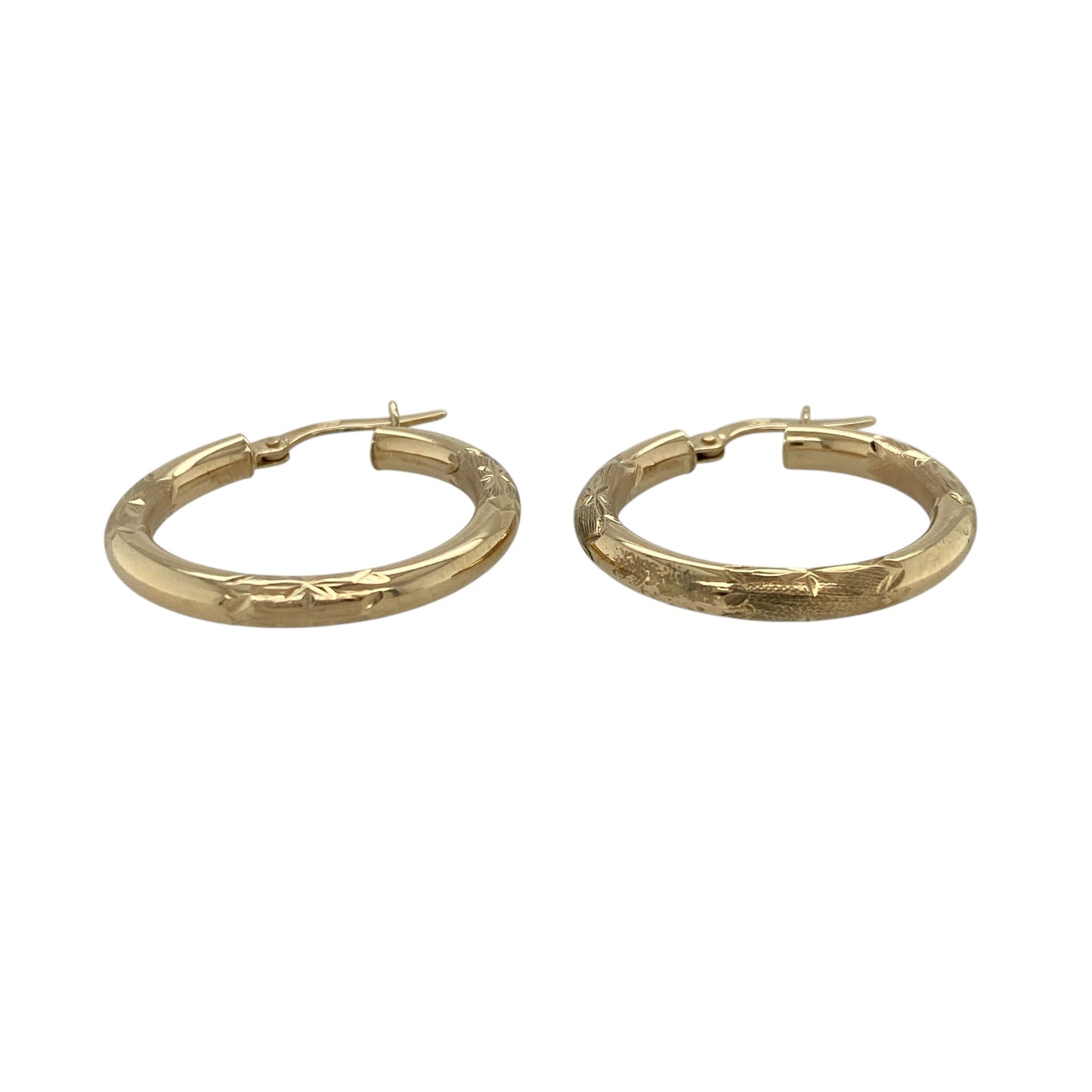 Add a touch of texture and timeless style to your jewellery collection with these pre-owned 9ct yellow gold patterned hoop creole earrings, offering classic design with decorative detail—perfect for everyday wear.

Design: The earrings feature a traditional hoop creole shape with an all-over patterned finish, creating subtle sparkle and visual interest.
Material: Made from 9-carat yellow gold, they have a polished and textured surface that enhances their warm tone and decorative appeal.