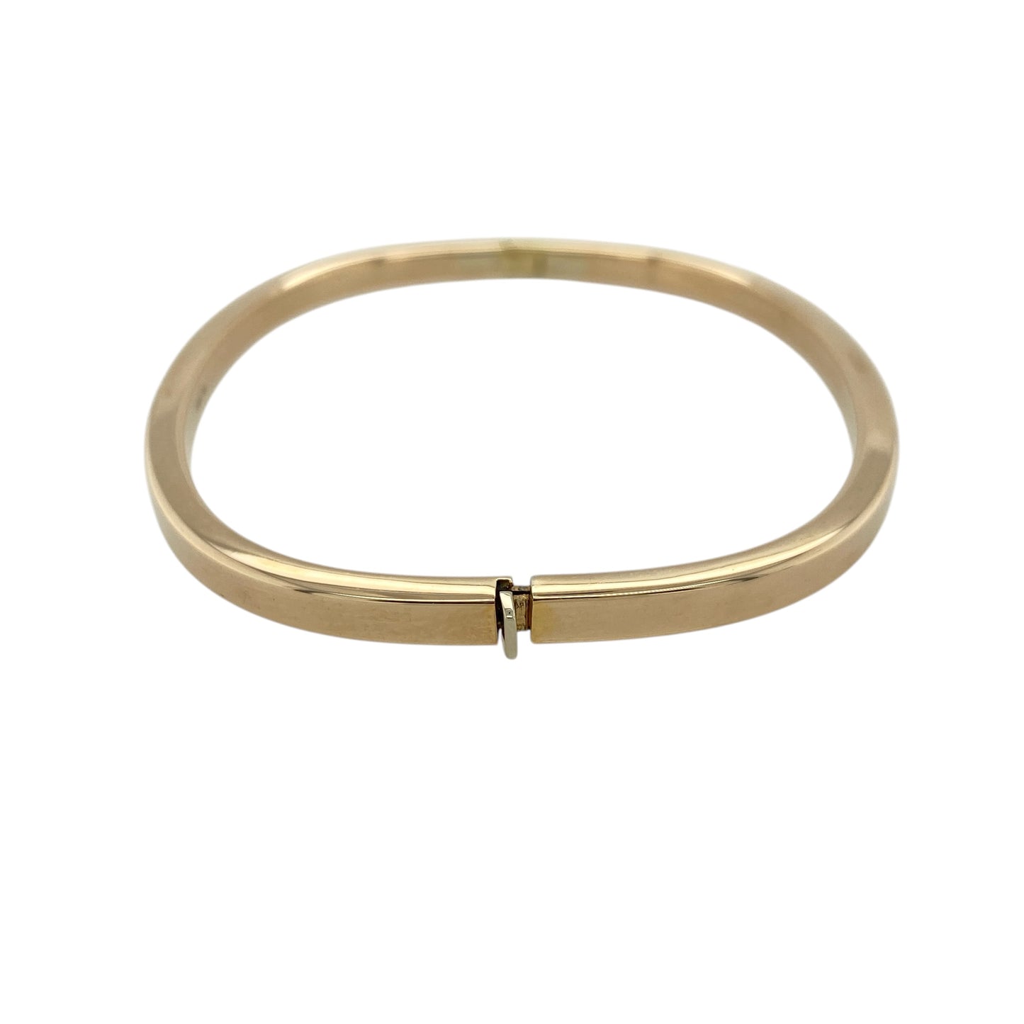 Add a sleek and contemporary piece to your jewellery collection with this pre-owned 9ct yellow gold plain squared hinged bangle, combining modern shape with timeless style—perfect for everyday wear or special occasions.

Design: The bangle features a distinctive squared profile with a smooth, plain finish, creating a clean and structured look.
Material: Made from 9-carat yellow gold, it has a polished surface that enhances its warm tone and modern appeal.