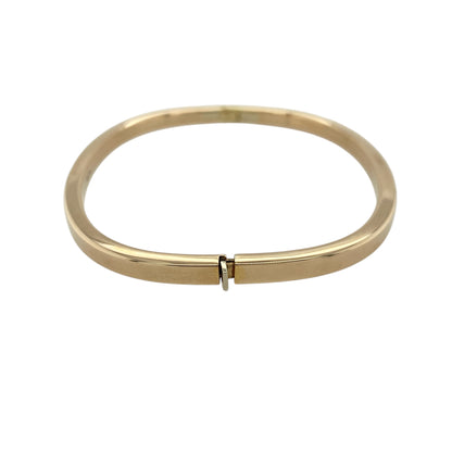 Add a sleek and contemporary piece to your jewellery collection with this pre-owned 9ct yellow gold plain squared hinged bangle, combining modern shape with timeless style—perfect for everyday wear or special occasions.

Design: The bangle features a distinctive squared profile with a smooth, plain finish, creating a clean and structured look.
Material: Made from 9-carat yellow gold, it has a polished surface that enhances its warm tone and modern appeal.