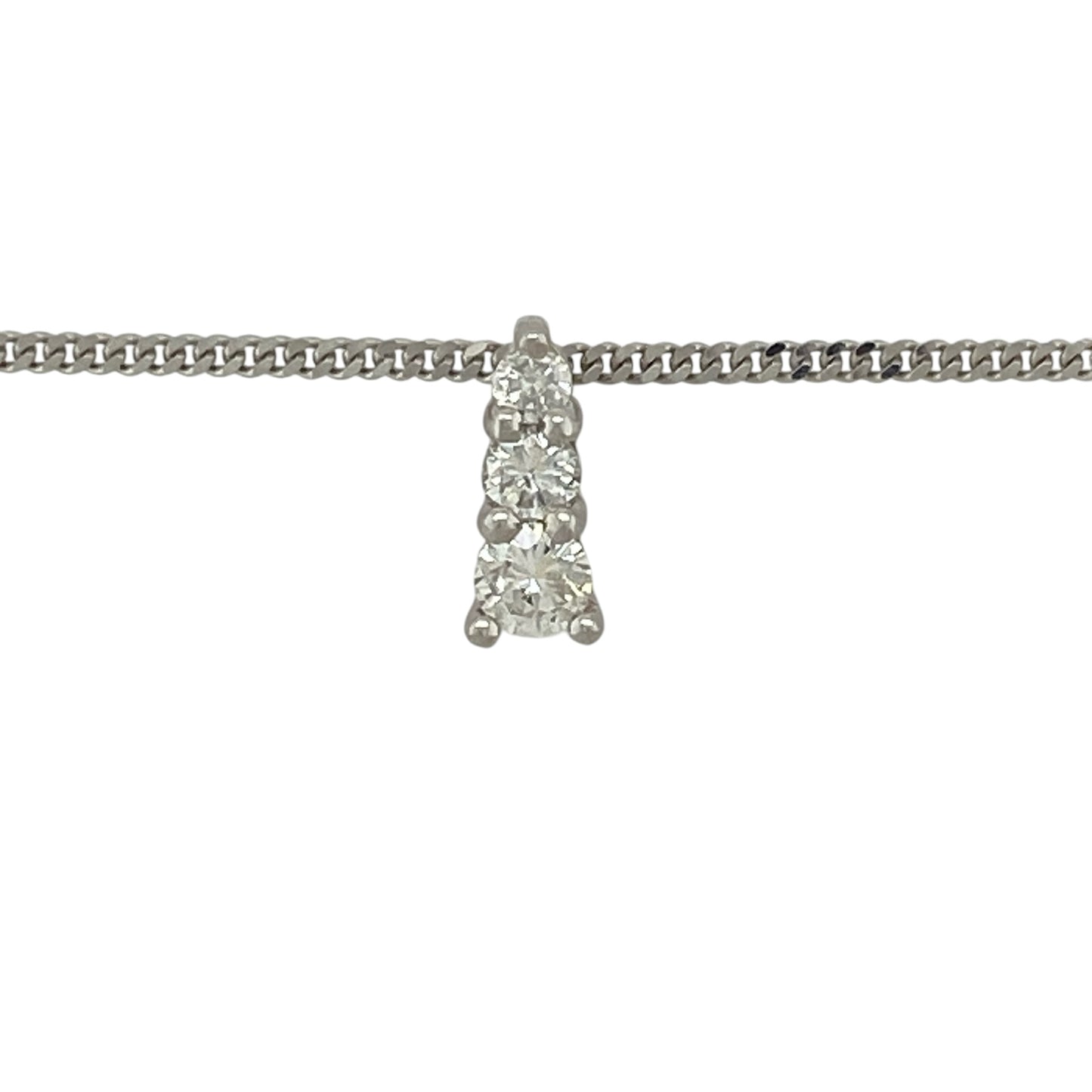 Add a touch of brilliance to your jewellery collection with this pre-owned 9ct white gold moissanite set trilogy pendant on a 16" curb chain necklace, combining classic design with exceptional sparkle—perfect for everyday wear or special occasions.

Design: The necklace features a timeless trilogy pendant design, showcasing three brilliant cut moissanite stones that symbolise past, present, and future.