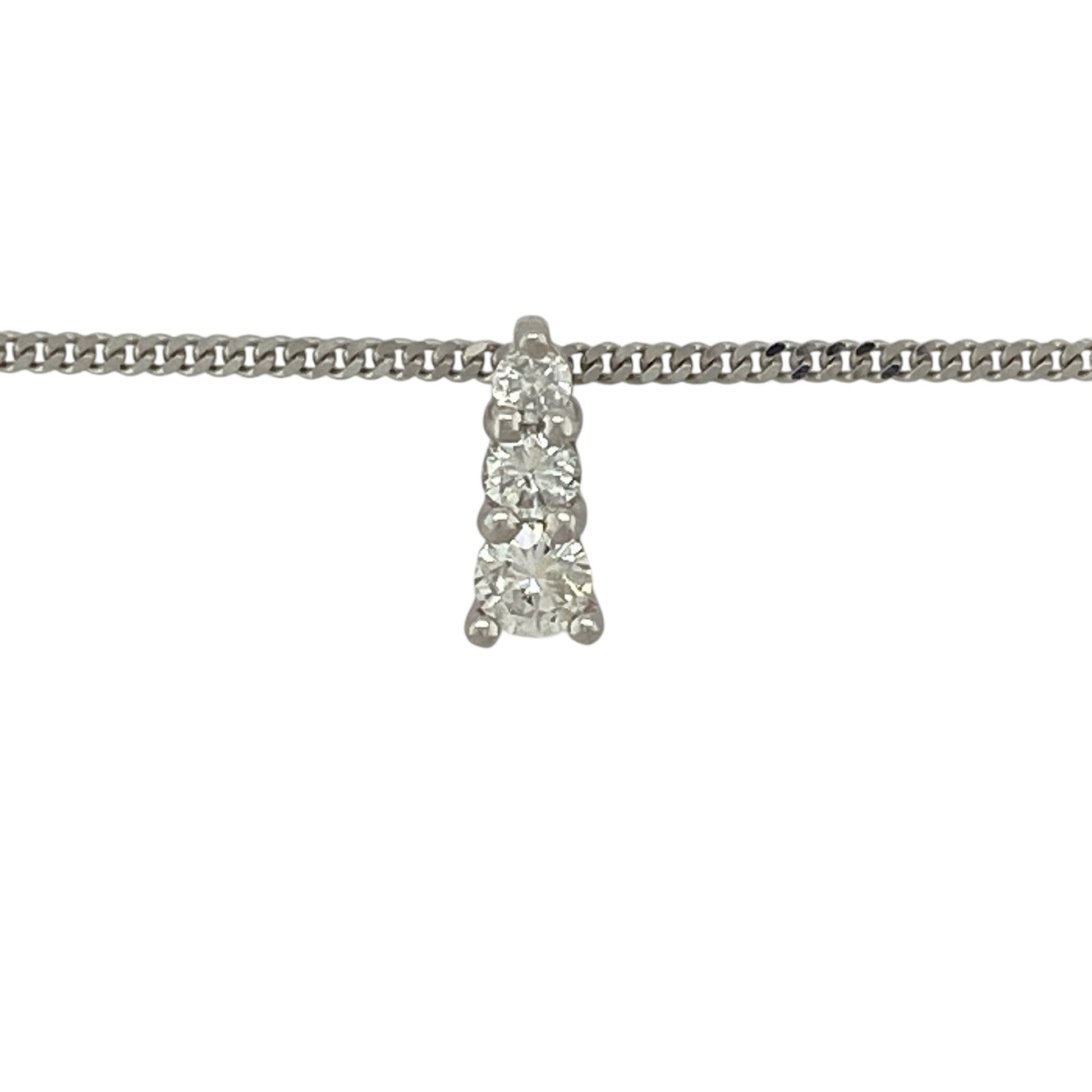 Add a touch of brilliance to your jewellery collection with this pre-owned 9ct white gold moissanite set trilogy pendant on a 16" curb chain necklace, combining classic design with exceptional sparkle—perfect for everyday wear or special occasions.

Design: The necklace features a timeless trilogy pendant design, showcasing three brilliant cut moissanite stones that symbolise past, present, and future.