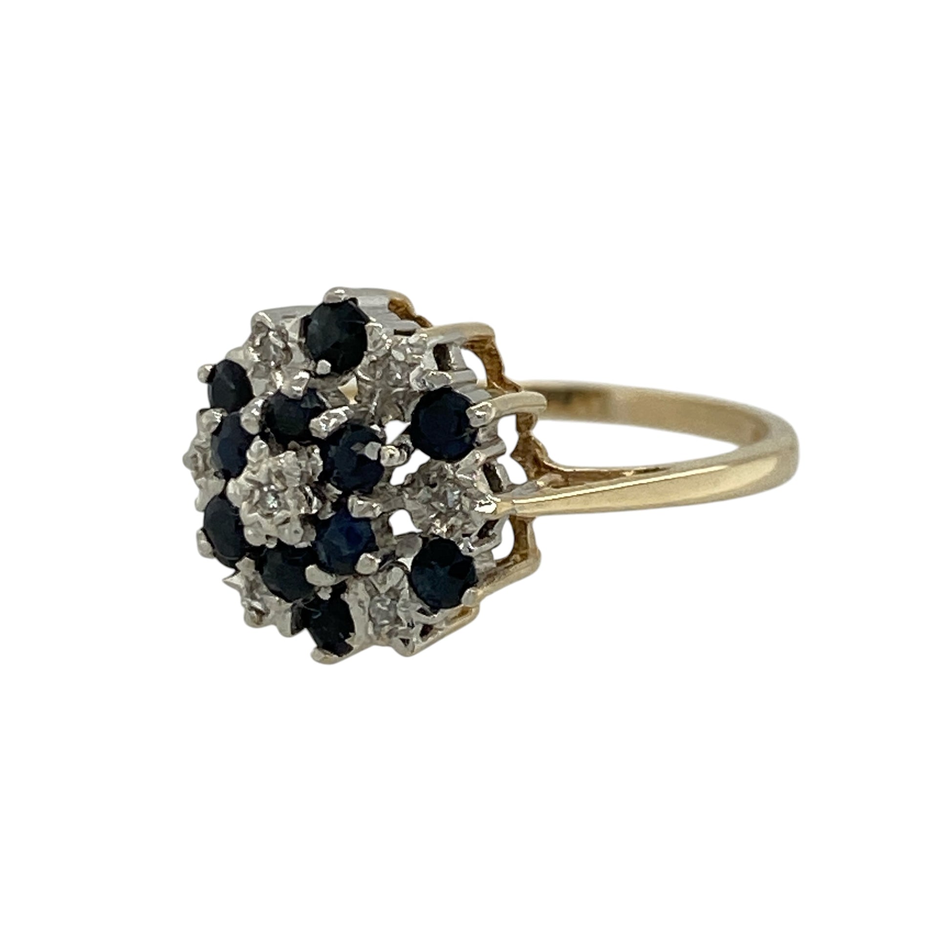 Add a bold and elegant piece to your jewellery collection with this pre-owned 9ct yellow gold diamond and sapphire set cluster ring, combining rich colour with classic sparkle—perfect for everyday wear or special occasions.

Design: The ring features a striking cluster design, showcasing multiple sapphires arranged with diamond accents to create a full and eye-catching look.