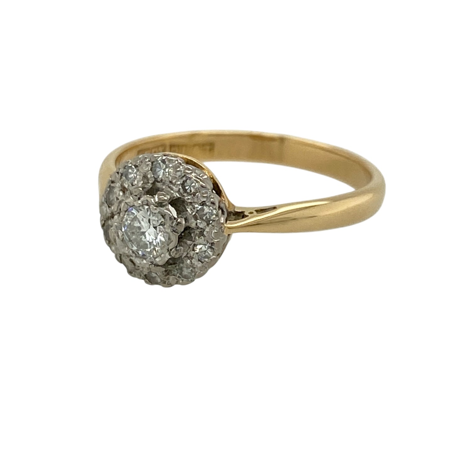Add a timeless and elegant piece to your jewellery collection with this pre-owned 18ct yellow gold and platinum diamond set flower cluster ring, combining classic design with delicate sparkle—perfect for special occasions or everyday wear.

Design: The ring features a refined flower cluster design, with diamonds arranged to form a soft floral shape that creates a balanced and eye-catching look.