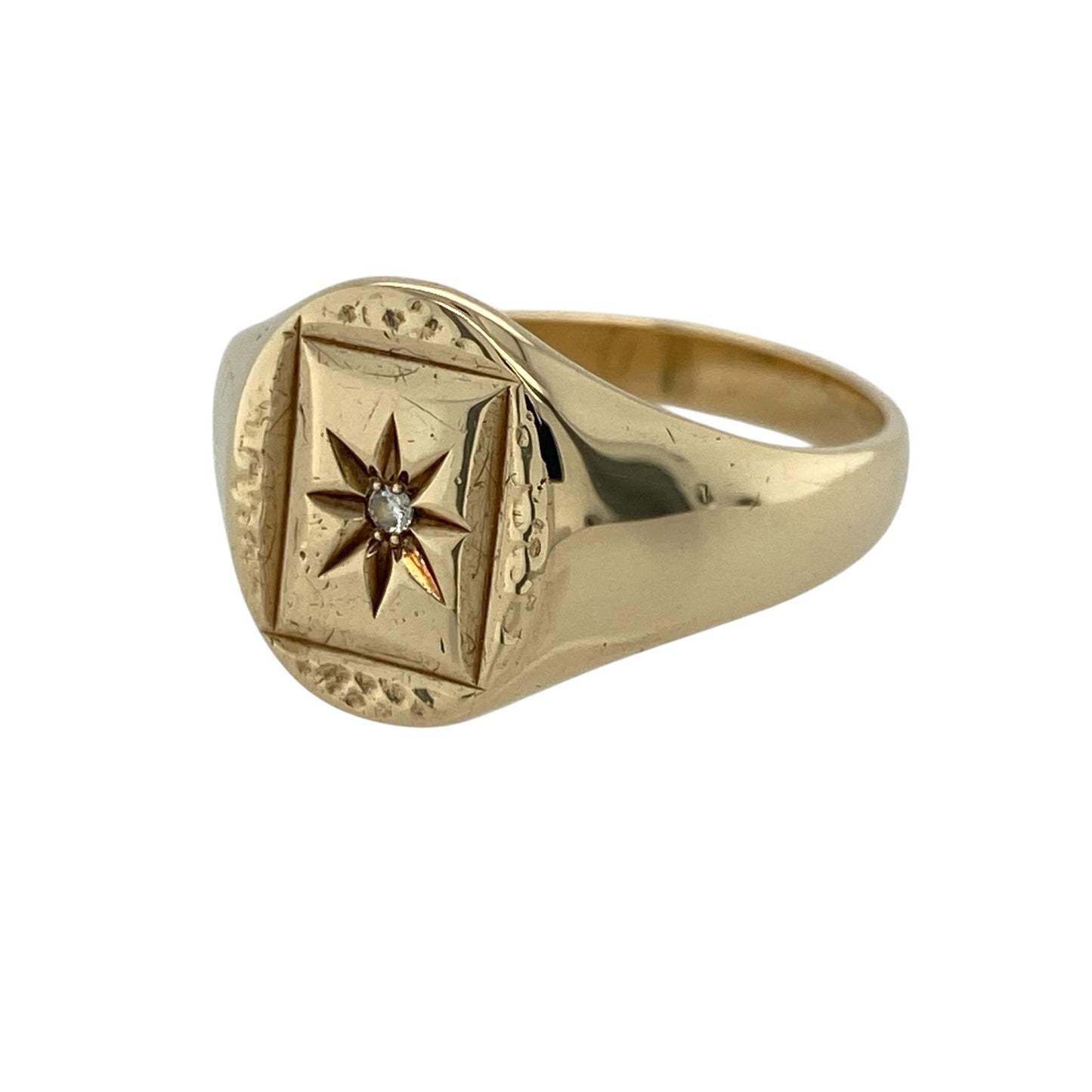 Add a bold and eye-catching piece to your jewellery collection with this pre-owned 9ct yellow gold diamond starburst set patterned oval signet ring, combining classic style with striking detail—perfect for everyday wear or making a statement.

Design: The ring features a traditional oval signet face with a starburst design at the centre, set with a diamond and surrounded by a patterned finish for added texture and character.