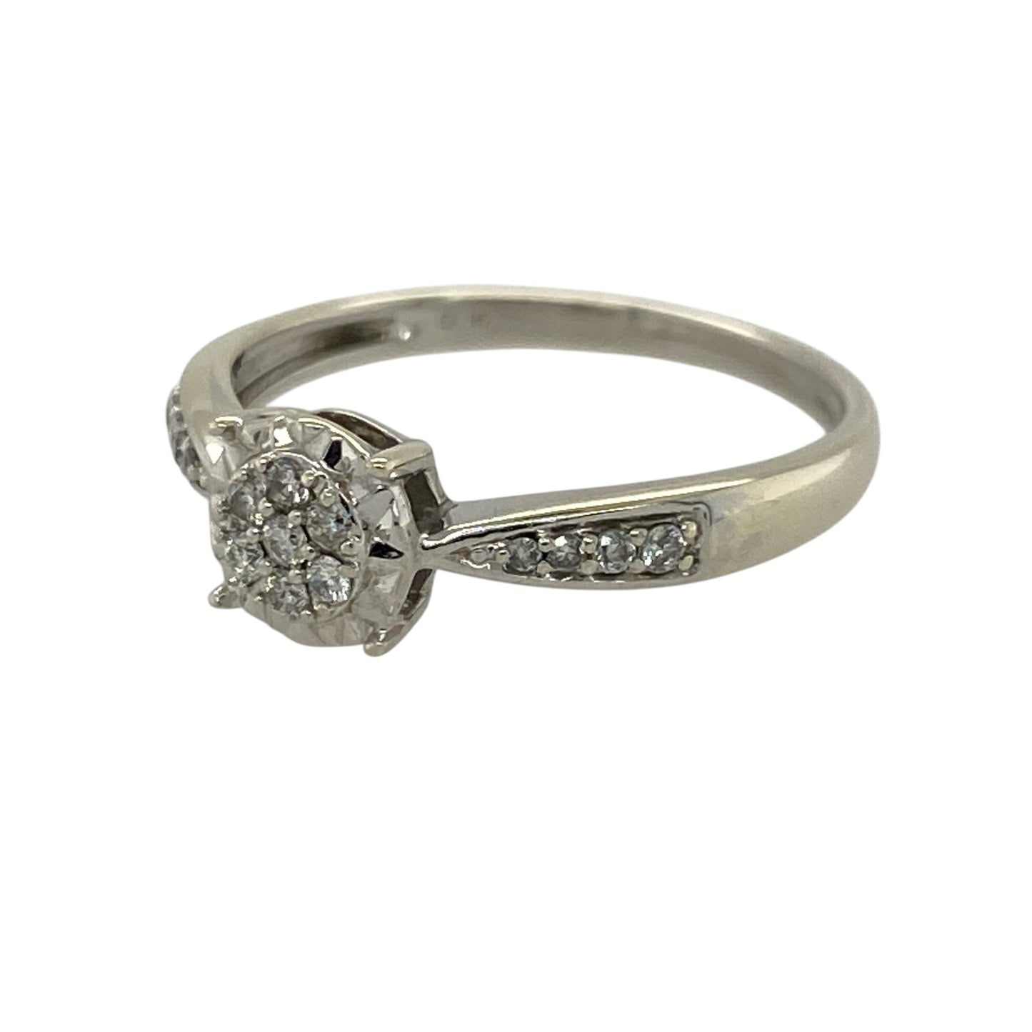 Add a touch of brilliance to your jewellery collection with this pre-owned 9ct white gold diamond illusion set cluster ring, combining classic design with enhanced sparkle—perfect for everyday wear or special occasions.

Design: The ring features a central illusion set diamond cluster, designed to maximise the appearance of size and sparkle, with additional diamonds set along the shoulders for added elegance.
