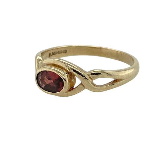 Add a meaningful and elegant piece to your jewellery collection with this pre-owned 9ct yellow gold garnet set Celtic style ring, combining rich colour with traditional design—perfect for everyday wear or special occasions.

Design: The ring features a Celtic-inspired design with intricate detailing along the band, centred with a vibrant oval garnet for a striking focal point.