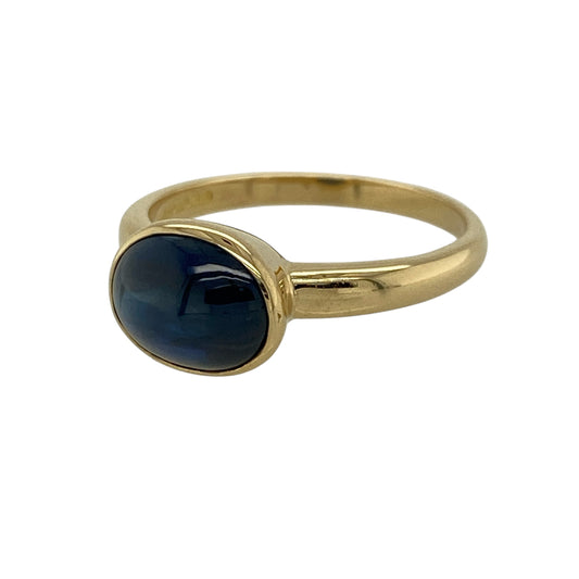 Add a bold and elegant piece to your jewellery collection with this pre-owned 18ct yellow gold dark blue oval stone solitaire ring, combining rich colour with timeless design—perfect for everyday wear or special occasions.

Design: The ring features a classic solitaire style, showcasing a large oval dark blue stone as the central focal point for a striking and refined look.