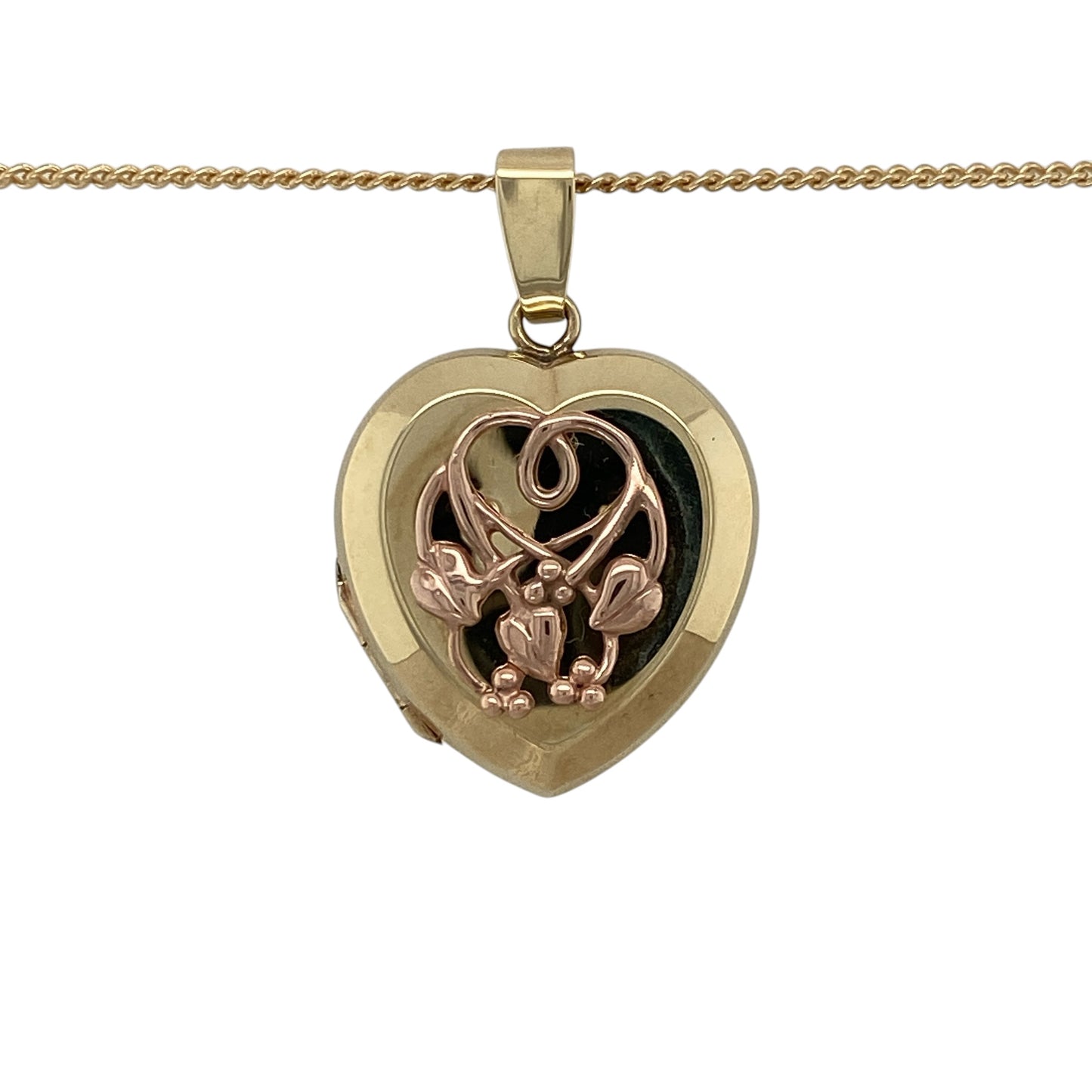 Add a meaningful and elegant piece to your jewellery collection with this pre-owned 9ct yellow and rose gold Tree of Life style heart locket on a 20" curb chain necklace, combining symbolic design with timeless style—perfect for everyday wear or as a thoughtful gift.

Design: The necklace features a heart-shaped locket with a Tree of Life style design, symbolising growth, strength, and connection, suspended from a classic curb chain.