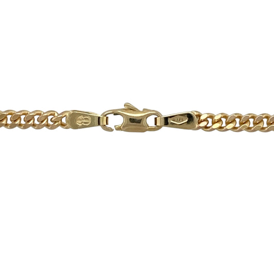 Add a classic and substantial piece to your jewellery collection with this pre-owned 9ct yellow gold 22" curb chain, combining timeless design with a strong and versatile presence—perfect for everyday wear or pairing with a pendant.

Design: The chain features a traditional curb link style with smooth, interlocking links, creating a clean and enduring look.
Material: Made from 9-carat yellow gold, it has a polished finish that enhances its warm tone and classic appeal.