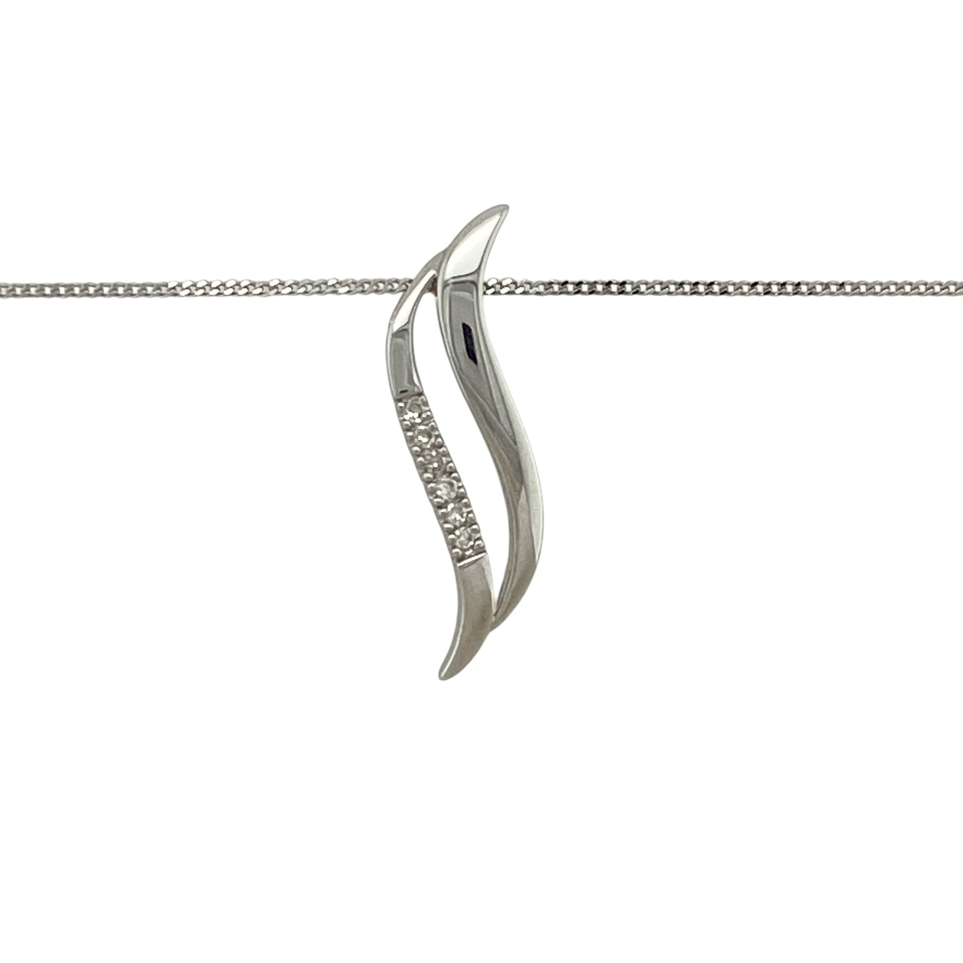 Add modern elegance and subtle sparkle to your jewellery collection with this pre-owned 9ct white gold diamond set two strand wave pendant necklace—perfect for everyday wear or layering.

Design: This pendant features a graceful two strand wave design, creating a flowing and contemporary look accented with sparkling diamonds for added brilliance. The pendant measures approximately 2.2cm in length, offering a delicate yet eye-catching presence.