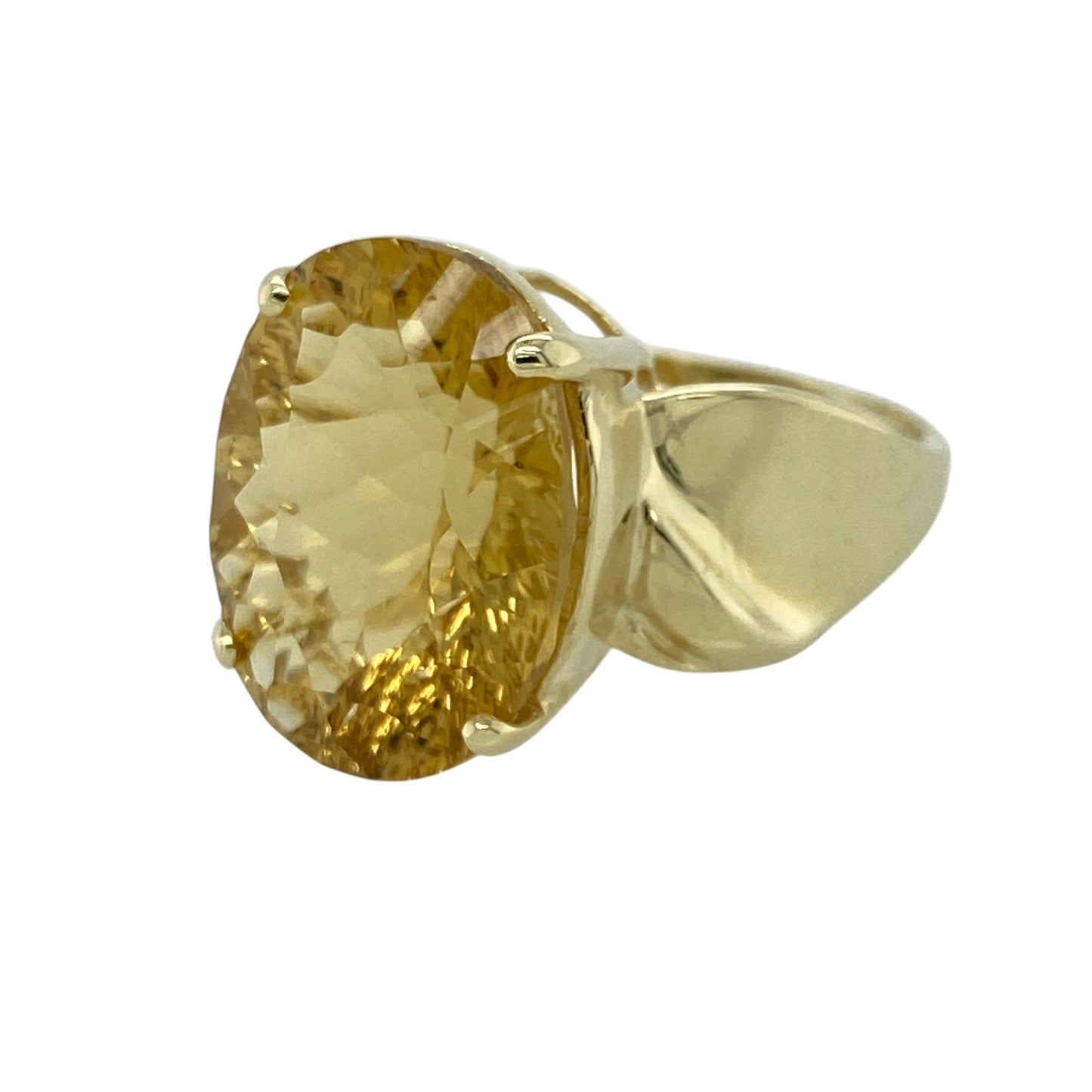 Make a bold statement with this pre-owned 9ct yellow gold citrine coloured stone set dress ring—an eye-catching piece that brings warmth and vibrant colour to any jewellery collection.

Design: This dress ring features a large oval citrine coloured stone measuring approximately 16mm by 12mm, creating a striking focal point with its rich golden hues and elegant shape.
Material: Made from 9-carat yellow gold, the polished finish enhances the warm tones of the stone while adding a classic and luxurious feel.