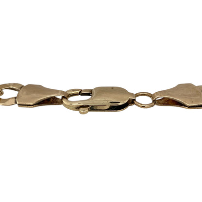 Add bold, classic style to your jewellery collection with this pre-owned 9ct yellow gold curb bracelet—an eye-catching and versatile piece perfect for everyday wear.

Design: This 8.5" bracelet features traditional curb links, closely interlocked to create a smooth and structured look. The 8mm width gives it a strong and noticeable presence on the wrist.
Material: Made from 9-carat yellow gold, the polished finish enhances the rich golden tone while highlighting the clean, timeless link design.
