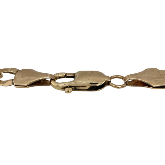 Add bold, classic style to your jewellery collection with this pre-owned 9ct yellow gold curb bracelet—an eye-catching and versatile piece perfect for everyday wear.

Design: This 8.5" bracelet features traditional curb links, closely interlocked to create a smooth and structured look. The 8mm width gives it a strong and noticeable presence on the wrist.
Material: Made from 9-carat yellow gold, the polished finish enhances the rich golden tone while highlighting the clean, timeless link design.