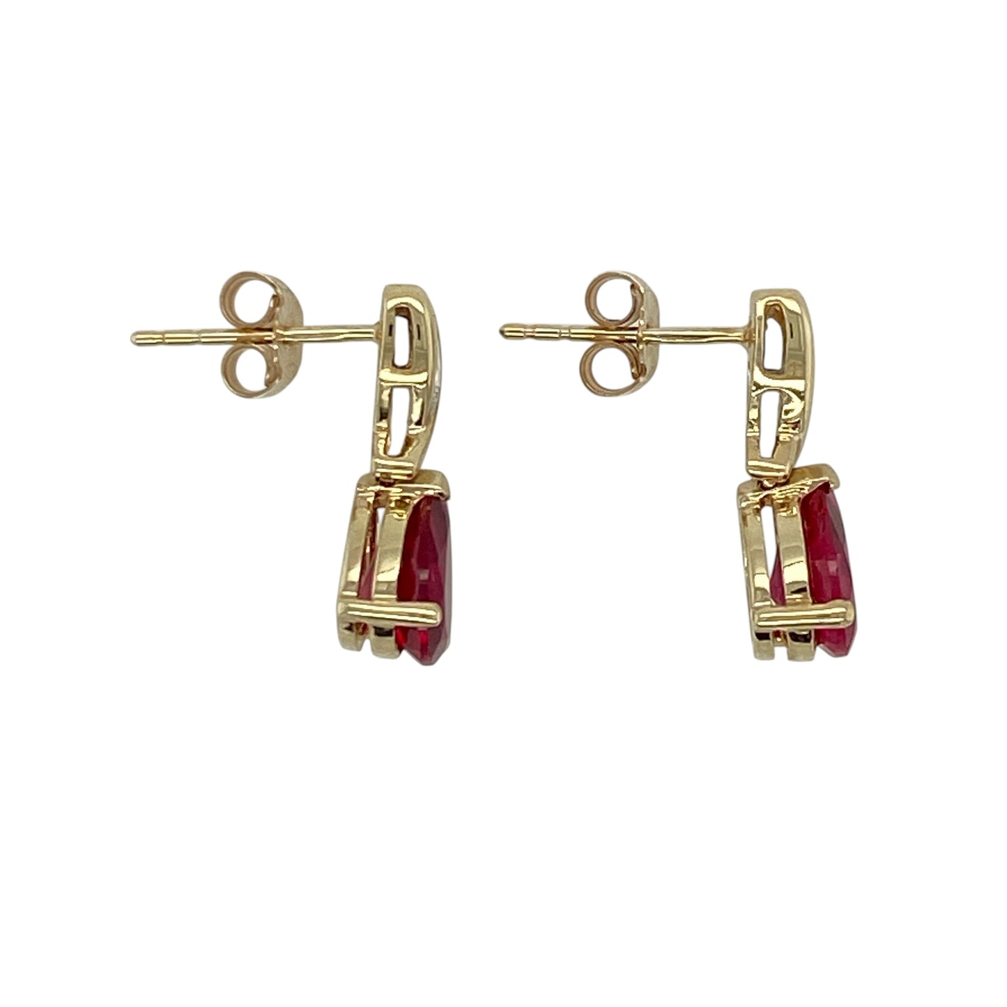 Add a touch of rich colour and timeless elegance to your jewellery collection with these pre-owned 9ct yellow gold diamond and ruby set stud earrings—perfect for both everyday wear and special occasions.

Design: These stud earrings feature beautifully shaped teardrop ruby gemstones, each measuring approximately 8mm by 6mm, accented with sparkling diamonds for added brilliance and a refined finish.