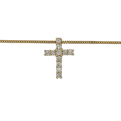 Add a meaningful touch of sparkle to your jewellery collection with this pre-owned 9ct yellow gold diamond set cross pendant necklace—an elegant and timeless piece perfect for everyday wear.

Design: This necklace features a classic cross pendant measuring approximately 1.4cm in length, accented with sparkling diamonds for a refined and delicate finish.
Material: Made from 9-carat yellow gold, the polished finish enhances the warmth of the gold while complementing the brilliance of the diamonds.