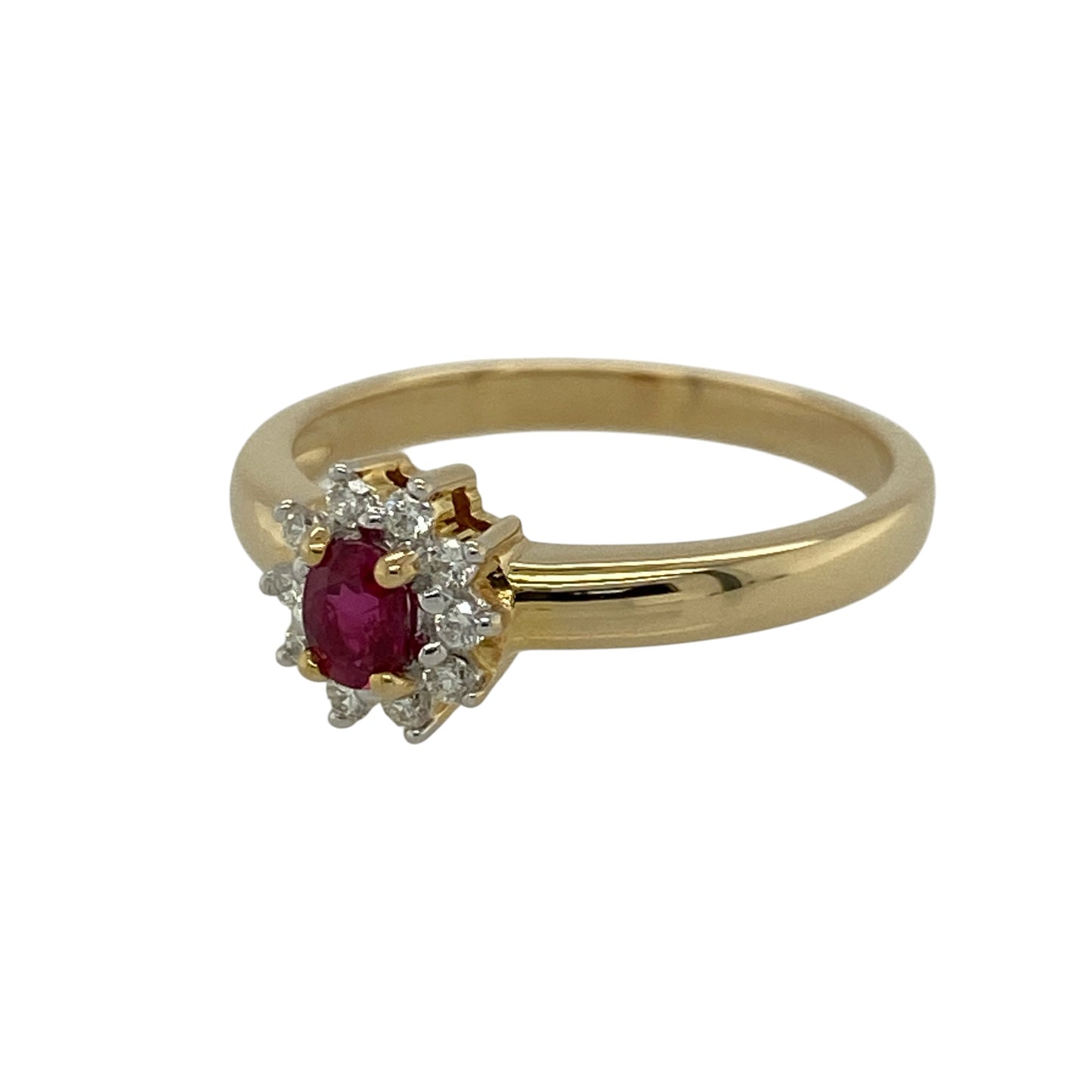 Add a touch of timeless elegance and rich colour to your jewellery collection with this pre-owned 18ct yellow gold diamond and ruby set cluster ring—an eye-catching piece perfect for special occasions or everyday luxury.

Design: This cluster ring features a central oval ruby measuring approximately 4mm by 3mm, surrounded by sparkling diamonds that create a radiant and balanced focal point.
