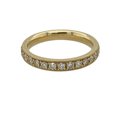 Add timeless elegance and continuous sparkle to your jewellery collection with this pre-owned 18ct yellow gold diamond set eternity milgrain edge style band ring—an exquisite piece perfect for special occasions or everyday luxury.

Design: This eternity band features a slim 3mm profile with diamonds set all the way around, enhanced by delicate milgrain edging for a refined and vintage-inspired finish.