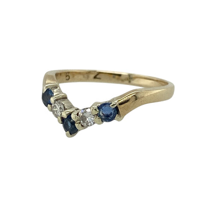 Add a touch of colour and sparkle to your jewellery collection with this pre-owned 9ct yellow gold diamond and sapphire set wishbone ring—an elegant and meaningful piece perfect for everyday wear or stacking.

Design: This wishbone-style ring features a graceful curved shape, set with sparkling diamonds and rich blue sapphires, each sapphire measuring approximately 2mm in diameter, creating a delicate and eye-catching finish.