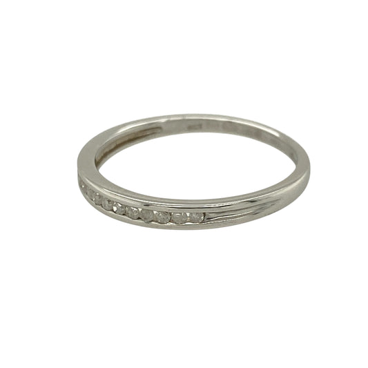 Add subtle sparkle and modern elegance to your jewellery collection with this pre-owned 9ct white gold diamond set band ring—an understated and versatile piece perfect for everyday wear.

Design: This band ring features a slim 2mm wide front, set with delicate diamonds that create a refined and minimalist look across the finger.
Material: Made from 9-carat white gold, the polished finish enhances the brilliance of the diamonds while offering a sleek and contemporary appearance.