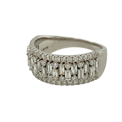 Add bold luxury and exceptional sparkle to your jewellery collection with this pre-owned 18ct white gold diamond set band ring—an eye-catching statement piece perfect for special occasions or everyday glamour.

Design: This ring features a wide 8mm front, set with a striking combination of baguette and brilliant-cut diamonds, creating a dynamic and textured look with impressive brilliance.