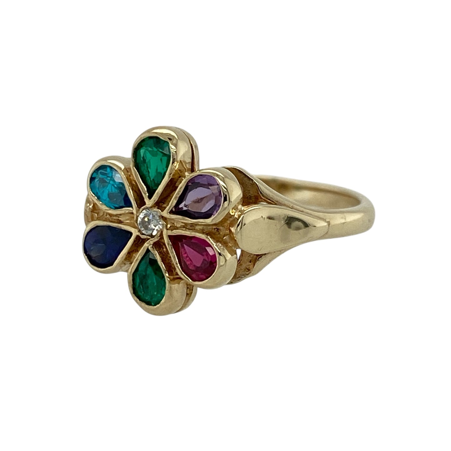 Add a vibrant burst of colour to your jewellery collection with this pre-owned 9ct yellow gold gemstone set flower ring—an eye-catching and playful piece perfect for everyday wear or special occasions.

Design: This ring features a striking flower design with a 12mm high front, with petals set in a mix of blue, green, red, and purple stones, creating a bright and lively display. A sparkling cubic zirconia sits at the centre, adding extra brilliance.