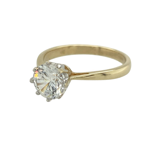 Add classic sparkle to your jewellery collection with this pre-owned 9ct yellow gold cubic zirconia set solitaire ring—an elegant and versatile piece perfect for everyday wear or special occasions.

Design: This solitaire ring features a single round cubic zirconia measuring approximately 7mm in diameter, creating a bright and eye-catching focal point with a timeless appeal.