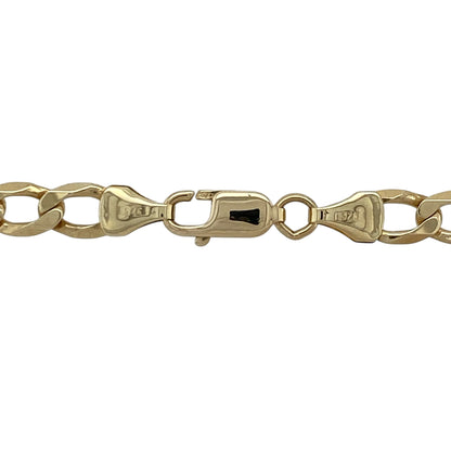 Add bold, classic style to your jewellery collection with this pre-owned 9ct yellow gold curb chain—an eye-catching and durable piece perfect for everyday wear.

Design: This 20" chain features traditional curb links, closely interlocked to create a smooth and structured look. The 5mm width offers a strong and noticeable presence on the neckline.
Material: Made from 9-carat yellow gold, the polished finish enhances the rich golden tone while highlighting the clean and timeless link design.