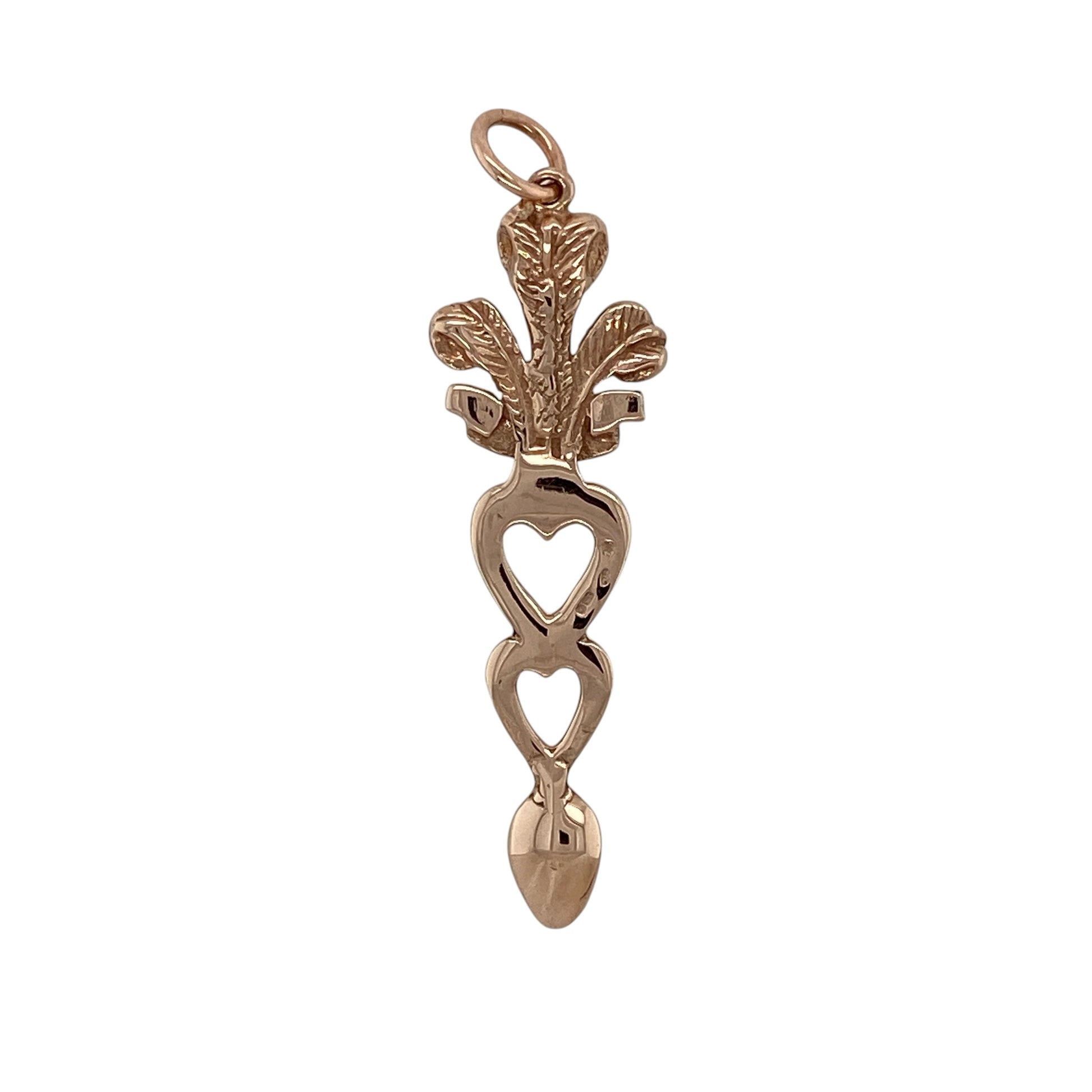 Add a meaningful touch of Welsh heritage to your jewellery collection with this pre-owned 9ct rose gold Cymru Gold Welsh Three Feathers heart lovespoon pendant—an elegant and symbolic piece perfect for everyday wear.

Design: This pendant features a beautifully detailed lovespoon design incorporating a heart motif and the iconic Welsh Three Feathers, creating a charming and culturally significant piece.