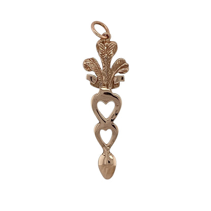 Add a meaningful touch of Welsh heritage to your jewellery collection with this pre-owned 9ct rose gold Cymru Gold Welsh Three Feathers heart lovespoon pendant—an elegant and symbolic piece perfect for everyday wear.

Design: This pendant features a beautifully detailed lovespoon design incorporating a heart motif and the iconic Welsh Three Feathers, creating a charming and culturally significant piece.
