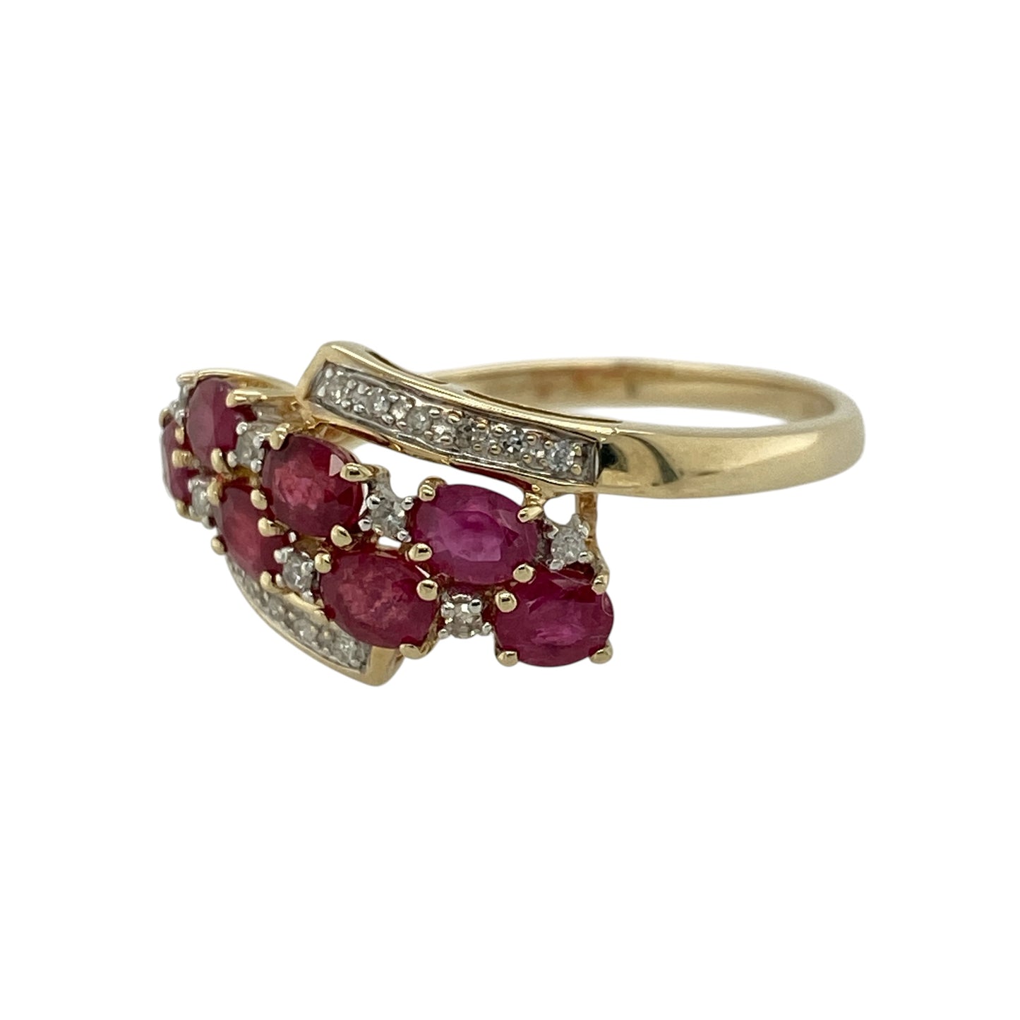 Add vibrant colour and elegant movement to your jewellery collection with this pre-owned 9ct yellow gold diamond and ruby set twist cluster ring—an eye-catching piece perfect for everyday wear or special occasions.

Design: This ring features a striking twist cluster design with an 11mm high front, set with oval ruby gemstones each measuring approximately 4mm by 3mm, with sparkling diamonds set in between to enhance the overall brilliance.