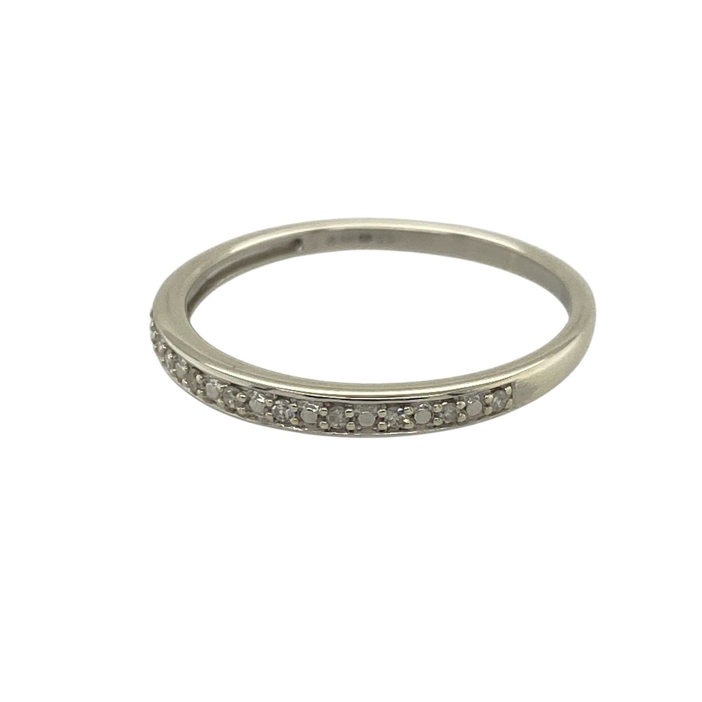 Add subtle sparkle and modern elegance to your jewellery collection with this pre-owned 9ct white gold diamond set band ring—an understated and versatile piece perfect for everyday wear.

Design: This band ring features a slim 2mm wide front, set with delicate diamonds that create a refined and minimalist look across the finger.
Material: Made from 9-carat white gold, the polished finish enhances the brilliance of the diamonds while offering a sleek and contemporary appearance.