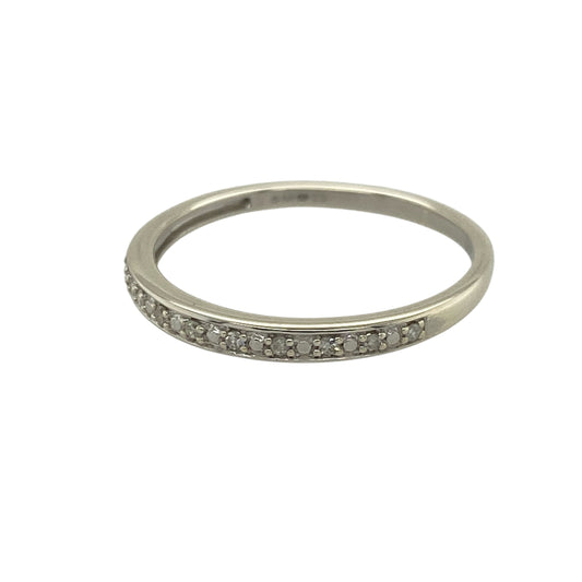 Add subtle sparkle and modern elegance to your jewellery collection with this pre-owned 9ct white gold diamond set band ring—an understated and versatile piece perfect for everyday wear.

Design: This band ring features a slim 2mm wide front, set with delicate diamonds that create a refined and minimalist look across the finger.
Material: Made from 9-carat white gold, the polished finish enhances the brilliance of the diamonds while offering a sleek and contemporary appearance.