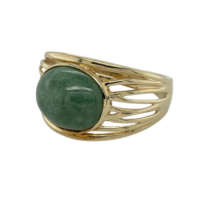 Add a touch of natural elegance to your jewellery collection with this pre-owned 9ct yellow gold jade set ring—an eye-catching and timeless piece perfect for everyday wear or special occasions.

Design: This ring features a striking oval jade gemstone measuring approximately 12mm by 10mm, creating a bold and smooth focal point, complemented by open weaved shoulders that add texture and visual interest.