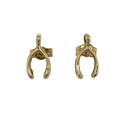 Add a subtle touch of charm to your jewellery collection with these pre-owned 9ct yellow gold wishbone stud earrings—an elegant and meaningful choice perfect for everyday wear.

Design: These stud earrings feature a delicate wishbone shape, offering a simple yet distinctive look that symbolises luck and positivity.
Material: Made from 9-carat yellow gold, the polished finish enhances the warm golden tone while keeping the design sleek and refined.