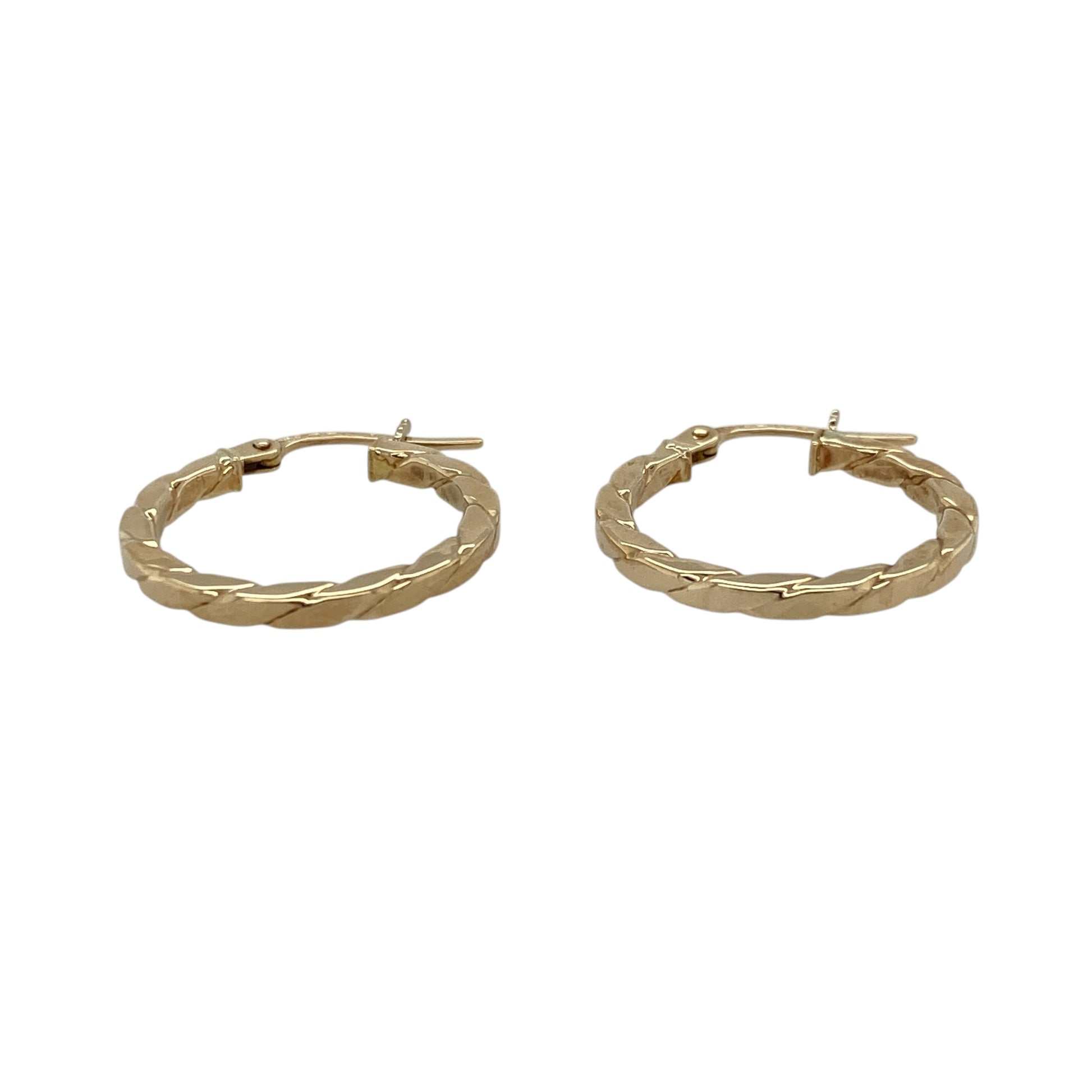 Add a stylish twist to your jewellery collection with these pre-owned 9ct yellow gold twisted flat hoop creole earrings—an elegant and versatile choice perfect for everyday wear.

Design: These hoop creole earrings feature a flat profile with a twisted design, creating a sleek yet textured look that catches the light beautifully.
Material: Made from 9-carat yellow gold, the polished finish enhances the warm golden tone while highlighting the twist detail.