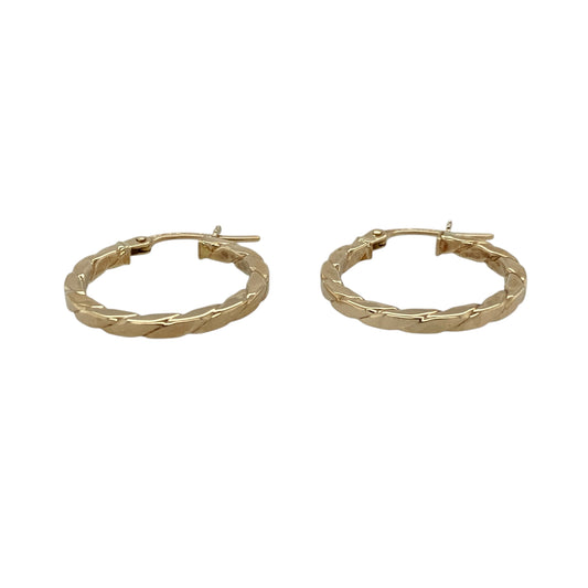 Add a stylish twist to your jewellery collection with these pre-owned 9ct yellow gold twisted flat hoop creole earrings—an elegant and versatile choice perfect for everyday wear.

Design: These hoop creole earrings feature a flat profile with a twisted design, creating a sleek yet textured look that catches the light beautifully.
Material: Made from 9-carat yellow gold, the polished finish enhances the warm golden tone while highlighting the twist detail.