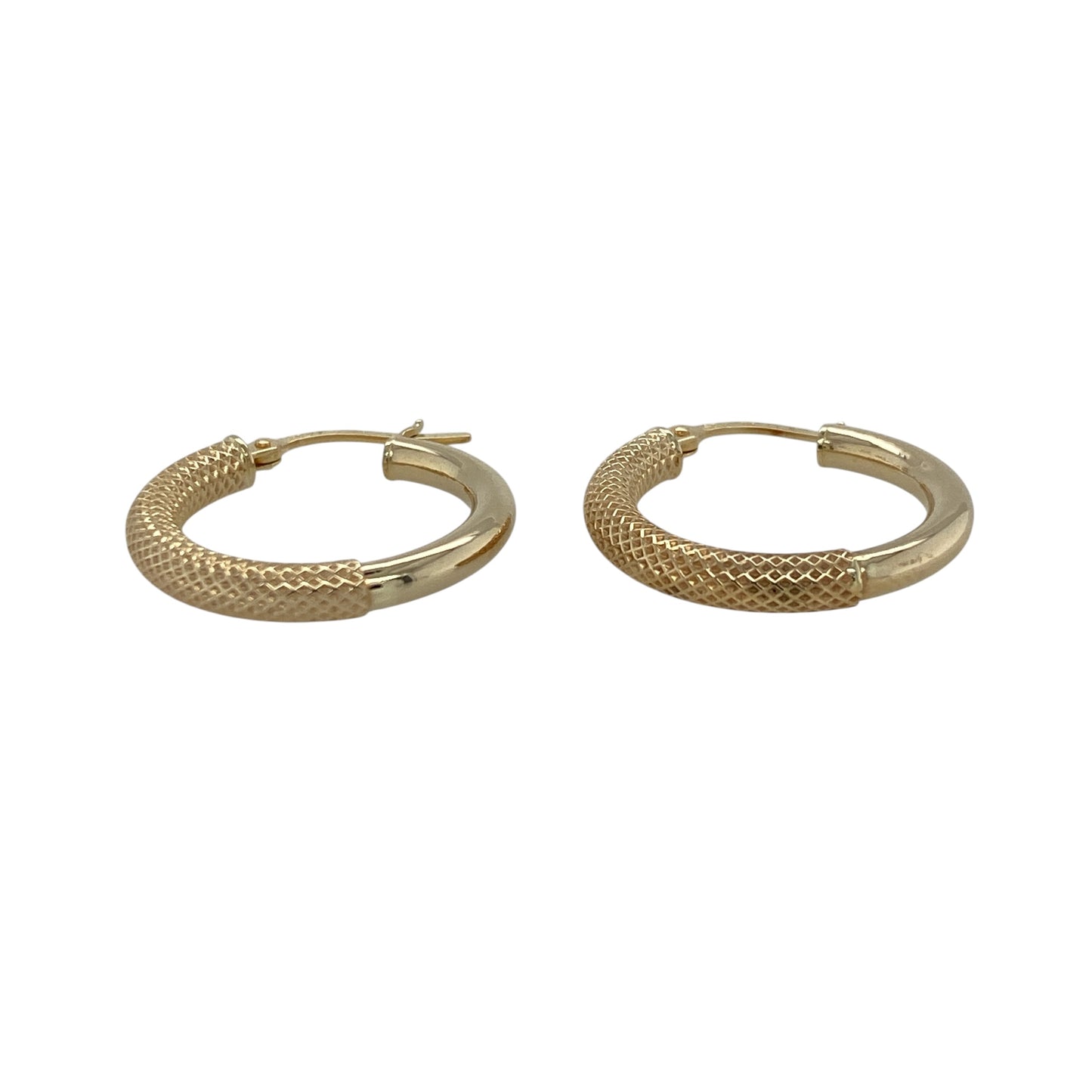 Add a touch of contrast and texture to your jewellery collection with these pre-owned 9ct yellow gold half textured half plain hoop creole earrings—an elegant and versatile choice for everyday wear.

Design: These hoop creole earrings feature a unique half textured, half plain design, combining smooth polished gold with a light-catching textured finish for a subtle yet eye-catching look.