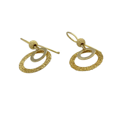 Add a touch of modern elegance and movement to your jewellery collection with these pre-owned 9ct yellow gold sparkle double circle drop earrings—an eye-catching and versatile choice for any occasion.

Design: These drop earrings feature a stylish double circle design, with interlinked rings that create a graceful and fluid look. The sparkle finish catches the light beautifully for added shimmer.