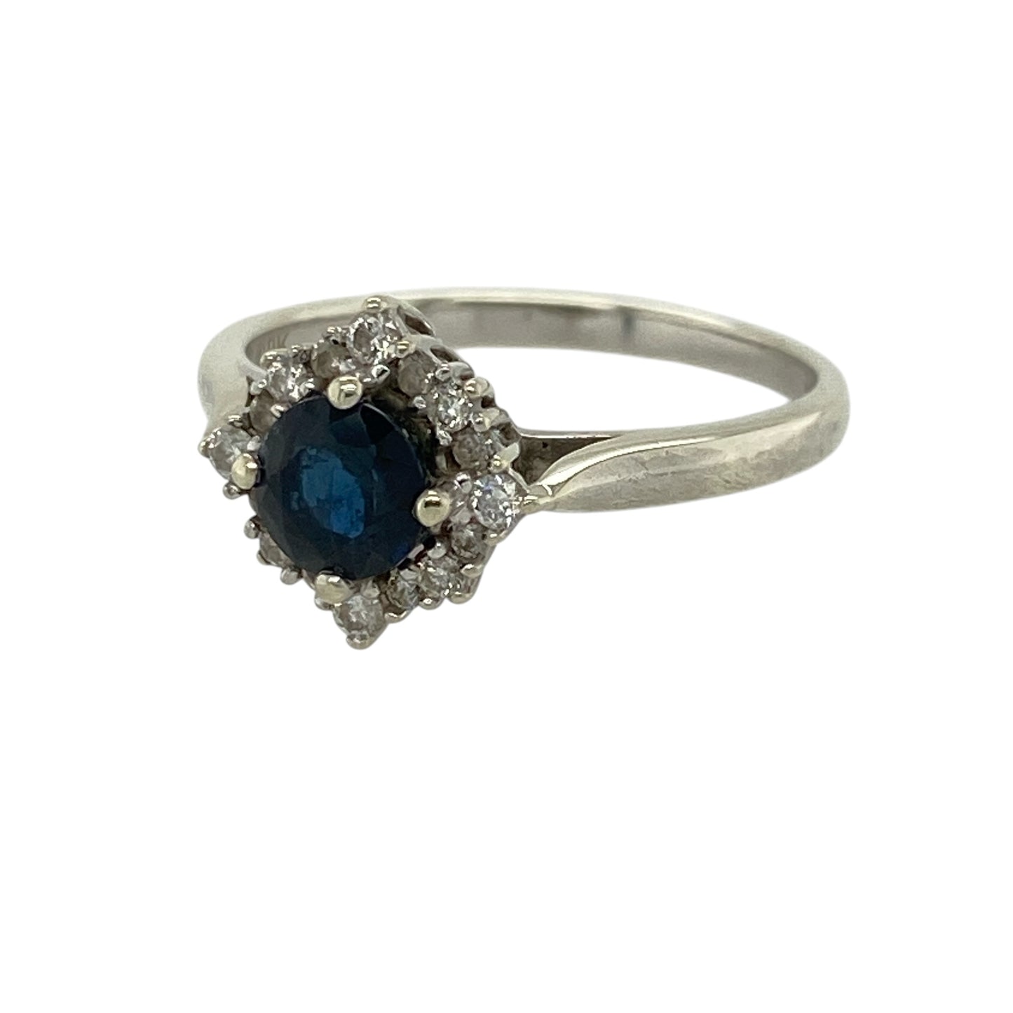 Add timeless elegance and rich colour to your jewellery collection with this pre-owned 9ct white gold diamond and sapphire set cluster ring—an eye-catching piece perfect for everyday wear or special occasions.

Design: This ring features a central sapphire measuring approximately 5mm in diameter, surrounded by sparkling diamonds that create a classic and radiant cluster design.