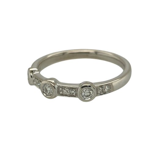 Add contemporary elegance and playful texture to your jewellery collection with this pre-owned 18ct white gold diamond set bubble band ring—an eye-catching piece perfect for everyday wear or stacking.

Design: This ring features a distinctive bubble-style band, with rounded sections set with sparkling diamonds. The band measures approximately 4mm wide at the bubble settings and tapers to around 2mm in between, creating a unique and flowing look.
