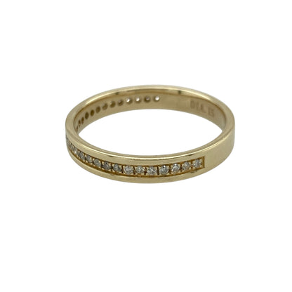 Add refined sparkle and timeless style to your jewellery collection with this pre-owned 9ct yellow gold diamond set band ring—an elegant and versatile piece perfect for everyday wear.

Design: This ring features a 3mm wide band, set with sparkling diamonds totalling approximately 0.15ct, creating a balanced and eye-catching look across the finger.
Material: Made from 9-carat yellow gold, the polished finish enhances the warm golden tone while complementing the brilliance of the diamonds.
