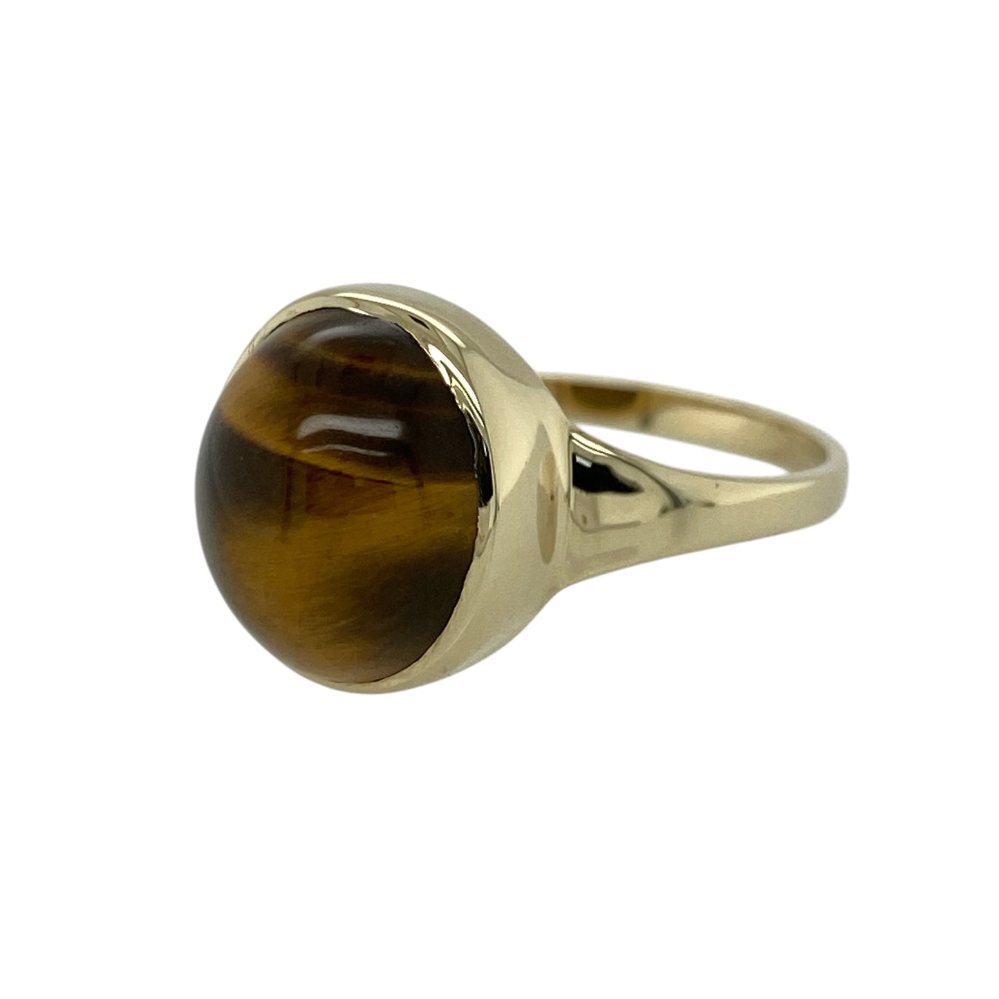 Bring warm earthy tones and bold character to your jewellery collection with this pre-owned 9ct yellow gold tiger’s eye ring, featuring a striking natural gemstone and classic statement styling—ideal for everyday wear or standout occasions.

Design: The ring showcases an oval-shaped tiger’s eye measuring approximately 12mm by 10mm, displaying rich golden-brown bands with a natural chatoyant shimmer that catches the light beautifully.