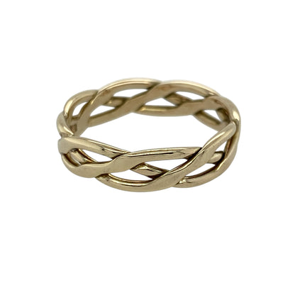 Add effortless style to your jewellery collection with this pre-owned 9ct yellow gold open weave band ring, featuring a delicate interwoven design—perfect for everyday wear or stacking with other favourites.

Design: The ring showcases an open weave pattern across the band, creating a flowing interlaced look that adds texture and visual interest.
Material: Made from 9ct yellow gold, the polished finish enhances the warm tone of the metal while highlighting the intricate detailing.