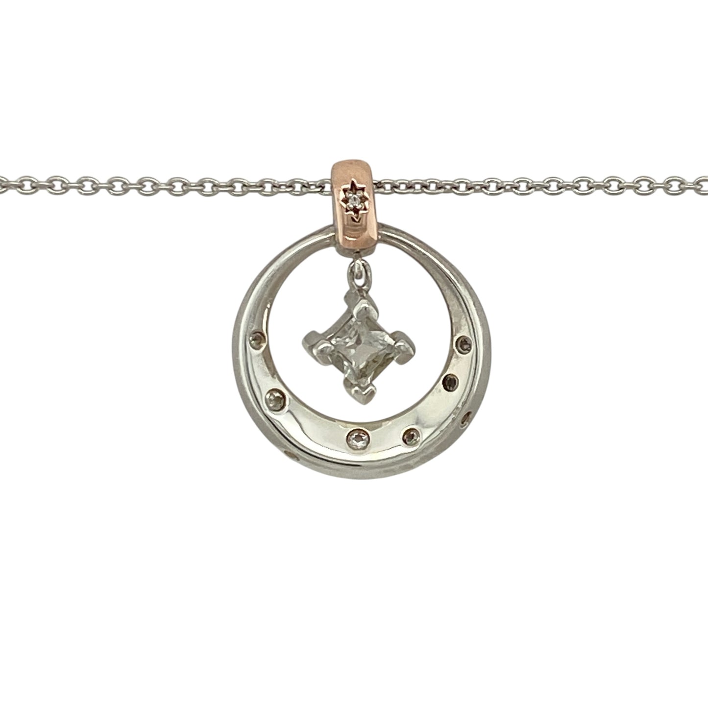 Add celestial-inspired elegance to your jewellery collection with this pre-owned 925 silver and 9ct rose gold Stars of Llyn Peninsula pendant necklace, featuring sparkling white topaz and graceful movement—perfect for everyday wear or special occasions.

Design: The pendant is composed of a round white topaz design, with a square white topaz stone suspended at the centre, creating a layered and eye-catching look with subtle movement.