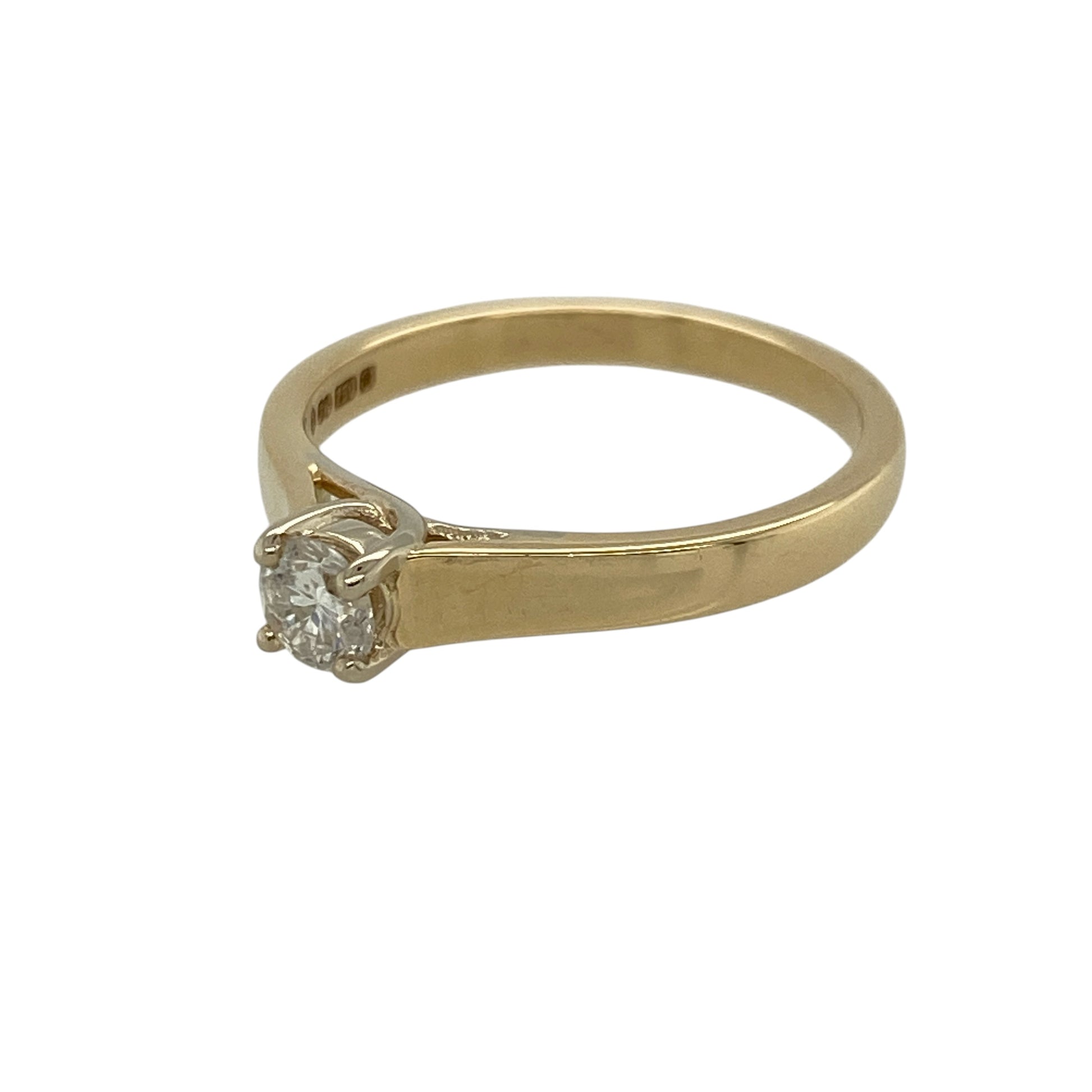 Add timeless elegance and classic sparkle to your jewellery collection with this pre-owned 18ct yellow gold diamond solitaire ring, featuring a refined design and brilliant centre stone—perfect for special occasions or everyday luxury.

Design: The ring showcases a single brilliant-cut diamond of approximately 0.25ct, offering a clean and sophisticated look with enduring appeal.