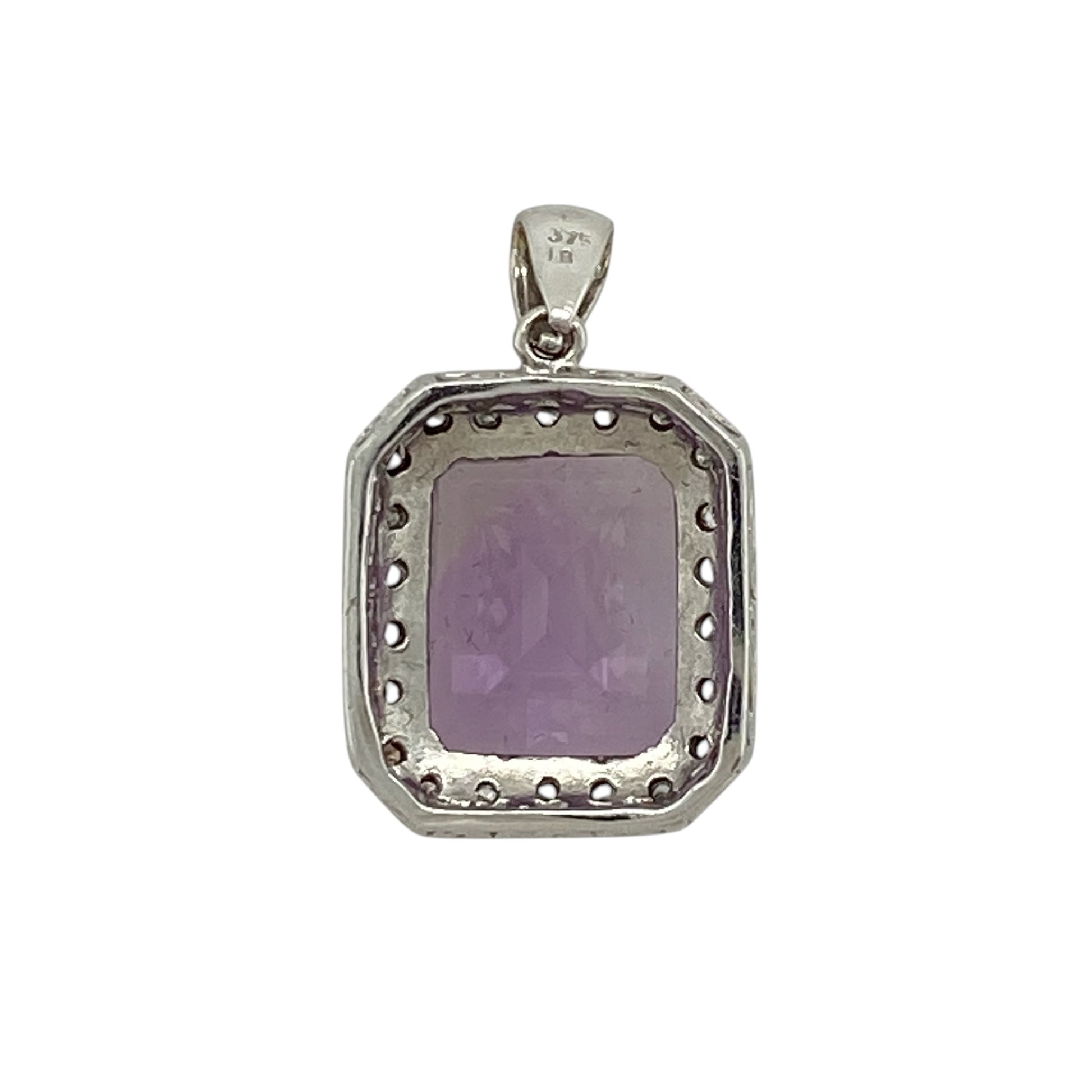 Add bold colour and refined sparkle to your jewellery collection with this pre-owned 9ct white gold diamond and amethyst pendant, featuring a striking centre stone and elegant surround—perfect for special occasions or statement everyday wear.

Design: The pendant showcases a rectangular amethyst measuring approximately 12mm by 10mm, surrounded by small diamonds that enhance its rich purple tones and create a classic cluster effect.