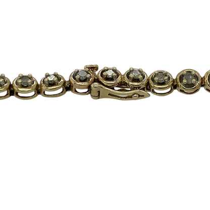 Add refined sparkle to your jewellery collection with this pre-owned 9ct yellow gold diamond set bracelet, featuring a classic design with elegant detailing—perfect for everyday wear or special occasions.

Design: The bracelet features a series of polished links accented with diamonds, creating a subtle yet eye-catching shimmer across the length.
Material: Made from 9ct yellow gold, the polished finish enhances the warm tone of the metal while complementing the brilliance of the diamonds.